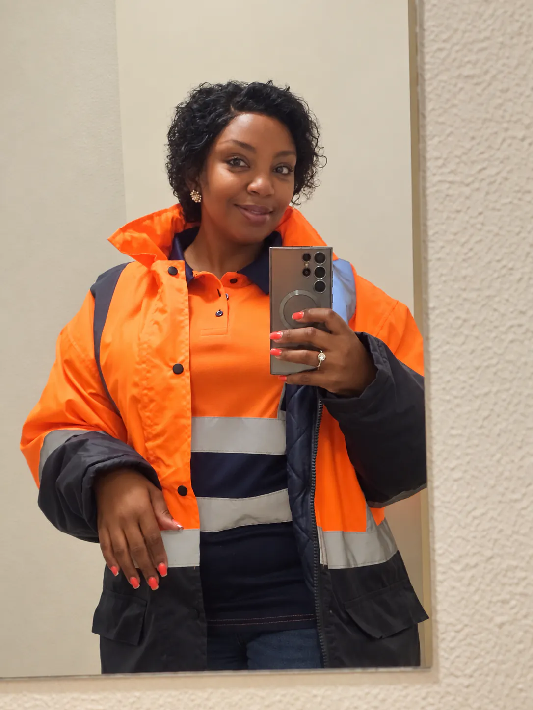 Pulane Buti, founder and director of Seldariah Trading, in high-visibility site clothing